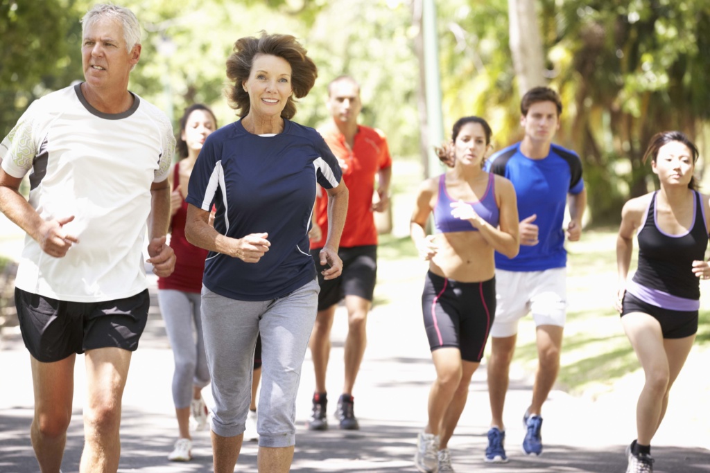 Group,of,runners,jogging,through,park