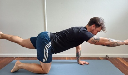 Man Doing Bird Dog Exercise