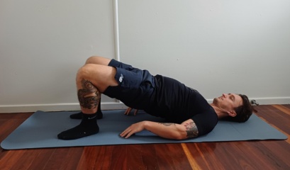 Man Performing The Glute Bridge Exercise