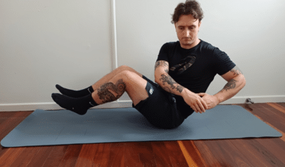 Man Performing The Russian Twist